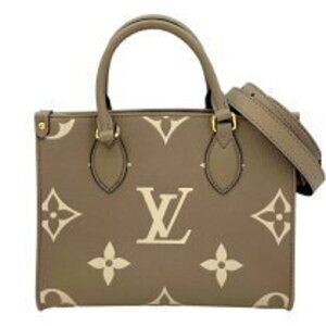 Louis Vuitton On the Go Tourtrell Crme Bicolor Empreinte Tote Bag